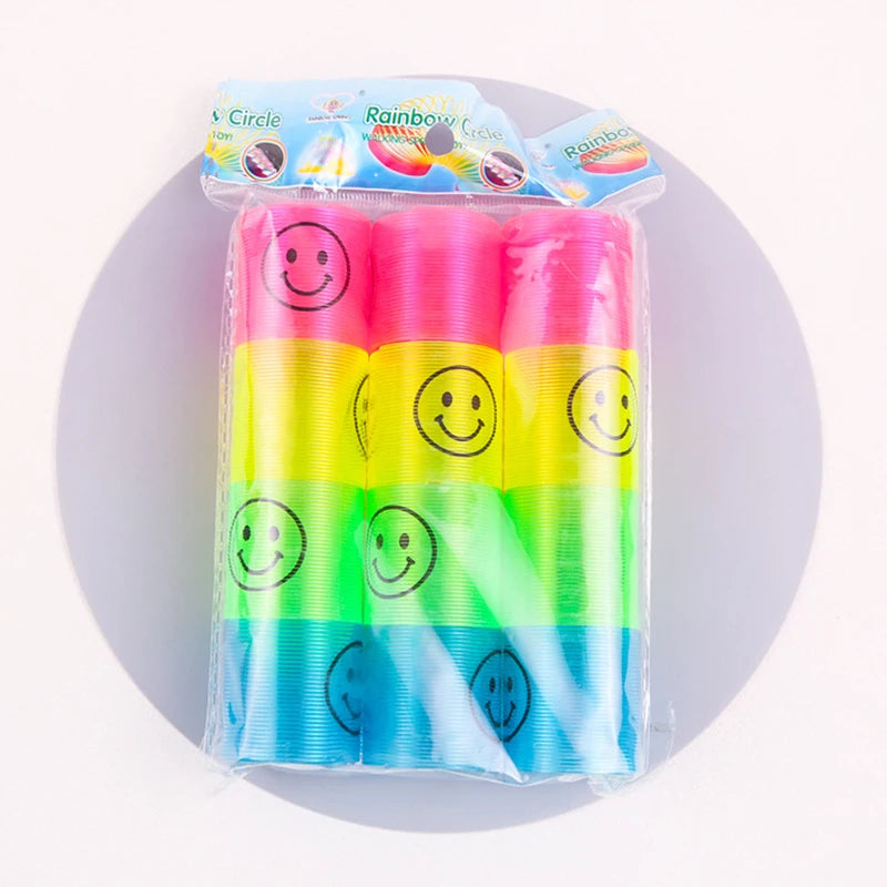 12pcs Children's Toys Colorful Spring Ring Mini Smiley Rainbow Ring Colorful Ring Elastic RingParty Game Activities Gift Toys